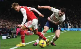  ?? FC/Getty Images ?? Arsenal’s Martin Ødegaard and Tottenham’s Pierre-Emile Højbjerg tangle during last season’s fixture at the Tottenham Hotspur Stadium. Photograph: Stuart MacFarlane/Arsenal