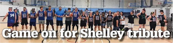  ?? ?? ●●The players line up on the court before Shelley Anne Bevan’s Basketball Memorial Game