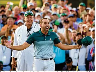  ?? JEFF SINER / CHARLOTTE OBSERVER ?? For Sergio Garcia, backed by caddie Glen Murray, it was an emotional breakthrou­gh as he sinks a 12-foot birdie putt to clinch a sudden-death playoff victory against Justin Rose.