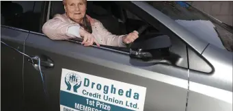  ??  ?? Fionnuala Cullen from Drogheda drives off in her new Toyota Auris won in the Credit Union car draw.