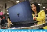  ?? – AFP ?? TORONTO: HP’s new Snapdragon Elite X powered laptop is used during a demonstrat­ion at the 2024 Collision tech conference at Enercare Centre in Toronto.