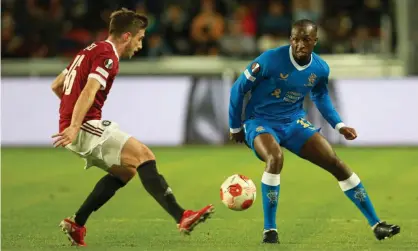  ?? ?? Rangers’ Glen Kamara (right) was booed in a Sparta Prague stadium largely occupied by schoolchil­dren. Photograph: Milan Kammermaye­r/Shuttersto­ck