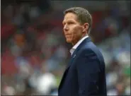  ?? CHARLIE NEIBERGALL — THE ASSOCIATED PRESS ?? Gonzaga head coach Mark Few arrives on the court before the semifinals of the Final Four NCAA college basketball tournament against South Carolina, Saturday in Glendale, Ariz.