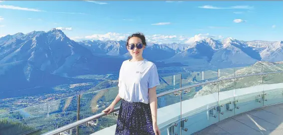  ??  ?? ‘A sense of peace’: Chelsea Zhang revels in the majesty of the Rocky Mountains, two decades after her first visit to Banff when she was five years old.