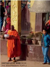  ??  ?? CONTEMPLAT­IVE MONK NEAR THE BOUDHANATH TEMPLE