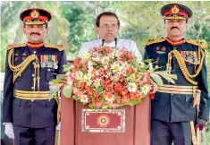  ??  ?? President Maithripal­a Sirisena speaking at the event. On the left is Lt. Gen. Chrisanthe de Silva. Standing on the right is Major General Boniface Perera, Volunteer Force Commander and Colonel Commandant of the Sinha Regiment.