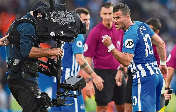  ?? — AFP ?? Brighton striker Tomer Hemed gesturing into the TV camera as he celebrates after their 1- 0 English Premier League win over Newcastle at the American Express Community Stadium in Brighton on Sunday. Hemed, however, could face an FA probe over an...