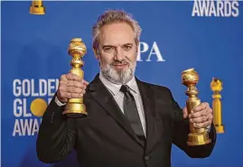  ?? Allen J. Schaben/Los Angeles Times/TNS ?? Director Sam Mendes, seen at the 2020 Gold Globe awards, has gained permission from the Beatles to create films about each member of the band.