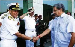  ??  ?? Raksha Mantri Manohar Parrikar being welcomed for his address during the inaugural session of the Naval Commanders Conference in New Delhi