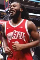  ?? GETTY IMAGES ?? Bruce Thornton celebrates after his 17 points helped Ohio State upset Iowa in the Big Ten tournament.