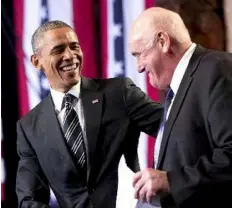  ??  ?? CHICAGO MEN: President Obama and Billy Lawless