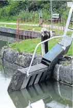 ?? PHOTO: KEVIN THOMAS ?? The damaged gate at Lock 24 lying at an angle following the boat collision.