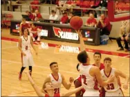  ?? MARK HUMPHREY ENTERPRISE-LEADER ?? Farmington senior guard Matt Wilson finishes at the basket after switching from his right to left hand while hanging in the air. Wilson scored 22 points as the Cardinals held off Providence Academy, 54-47, Jan. 31.