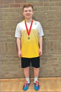  ??  ?? Taynuilt badminton star Harry Mobey pictured with his medal, after winning an under-18s event in Durham last weekend.