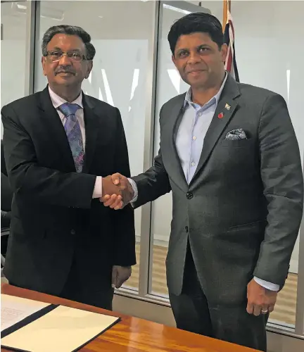  ?? Photo: Maraia Vula ?? K. Bhindi Brothers Limited director Vinod K. Bhindi with Attorney-General and Minister for Economy Aiyaz Sayed-Khaiyum at the Ministry of Economy, Level 10, Ro Lalabalavu House on October 24, 2018.