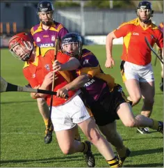  ??  ?? Tomás Hayden of Askamore tackles Joe Kelly (Shelmalier­s).