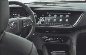  ?? RYAN GARZA/USA TODAY NETWORK ?? A touchscree­n that is tilted toward the driver to make the screen safer to use is featured a 2021 Buick Envision ST.