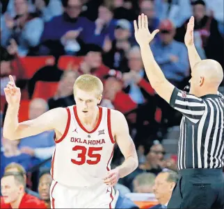  ?? Oklahoma's Brady Manek reacts after making a 3-point basket during Tuesday night's Big 12 game against Kansas at Lloyd Noble Center. [SARAH PHIPPS/THE OKLAHOMAN] ??