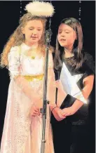  ??  ?? Star acts Canberra’s Hope Elliot is an Angel and Aimee Brown was Sparkle, the star of the show