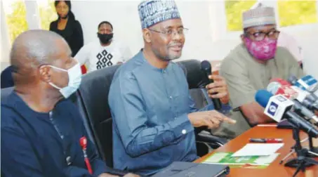  ??  ?? L-R: Greg Ashefor, director, strategic knowledge and management, National Agency for the Control of AIDS (NACA), Gambo Aliyu, director general, NACA; and Alex Ogundipe, director, community prevention and planning, NACA, during a briefing on 2020 Quarterly HIV Fact Sheet in Abuja, recently