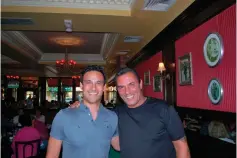  ?? Brad Balukjian via AP ?? ■ Brad Balukjian, Brad Balukjian, left, stands with former major league outfielder Lee Mazzilli on July 18, 2015, in Rye, New York. Balukjian tore open a pack of 1986 Topps baseball cards, chewed the stale, brittle bubblegum and then planned a journey most sports fans could only dream about. The self-funded trip in 2015, to meet every player whose image appeared on those old pieces of cardboard, cost about $8,000 and took him across 30 states over 11,341 miles in 48 days — fueled by 123 cups of coffee.