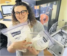  ??  ?? Help Lauren McCombe from Stirling Council’s Libraries Service is using 3D printing technology to produce vital PPE equipment for NHS staff and other essential workers