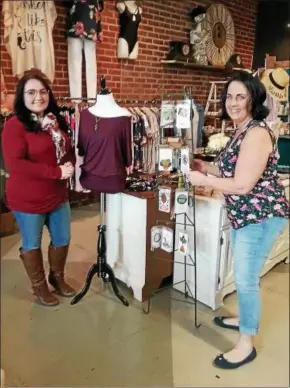  ?? JEAN BONCHAK — FOR THE NEWS-HERALD ?? Niki Betteley of Fairport Harbor, left, and Darlene O’Donnell of Montville Township own The Gravel Pit, a specialty shop featuring reclaimed vintage, industrial, and customized furniture and art as well as gifts and other accessorie­s.