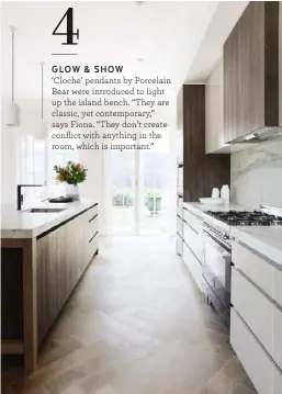  ??  ?? GLOW & SHOW
‘Cloche’ pendants by Porcelain Bear were introduced to light up the island bench. “They are classic, yet contempora­ry,” says Fiona. “They don’t create conflict with anything in the room, which is important.”