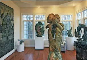  ??  ?? 04 The solarium in Rich and Kim Reading’s home exclusivel­y features sculptures by Abraham Anghik Ruben