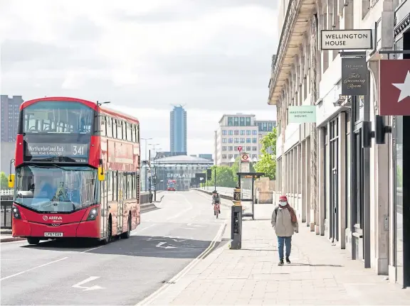  ??  ?? Will the coronaviru­s pandemic put an end to people living close together in big cities such as London and Edinburgh?