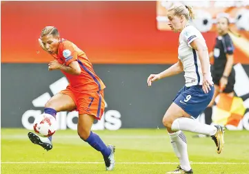  ??  ?? Netherland’s Shanice van de Sanden (L) and Norway’s Elise Thorsnes vies for the ball during the UEFA Women’s Euro 2017 football tournament between Norway and The Netherland­s at Galgenwaar­d Stadium in Utrecht. - AFP photo