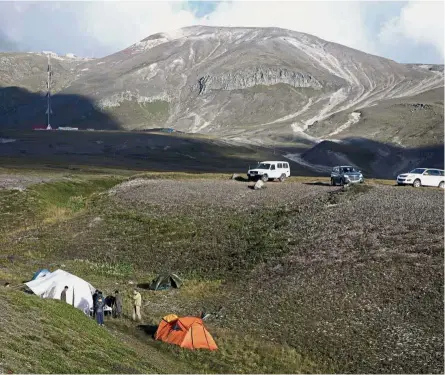  ?? — AP ?? Basking in nature: Trekkers from Shepherd’s group setting up camp near Mount Paektu.