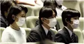  ?? The Yomiuri Shimbun ?? From left, Crown Princess Kiko, Crown Prince Akishino and their son Prince Hisahito watch the opening ceremony in Tokyo on Sunday.