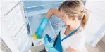  ??  ?? The interior surfaces of your appliances, like the fridge, also need to be cleaned occasional­ly.