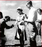  ??  ?? Above: Elizabeth and Philip meeting members of the Nyeri Polo Club, shortly before her father King George VI died. Below: At Government House, Nairobi, in February 1952.