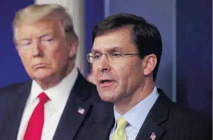  ?? PHOTO: REUTERS ?? In the firing line . . . President Donald Trump listens to Secretary of Defence Mark Esper address the daily White House coronaviru­s response briefing earlier this year.