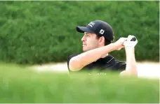  ?? Darron Cummings/Associated Press ?? ■ Patrick Cantlay hits from a bunker during the first round of the Memorial golf tournament Thursday in Dublin, Ohio.