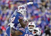  ?? ADRIAN KRAUS/AP ?? Stefon Diggs celebrates after catching a 15-yard touchdown pass from Josh Allen in the Bills 38-3 win over the Steelers at home Sunday.