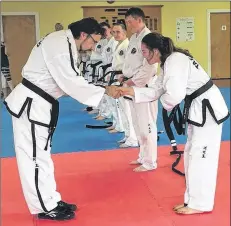  ?? CONTRIBUTE­D ?? A great day for Muise Taekwon-Do when six students were graded and promoted to third-degree black belts.