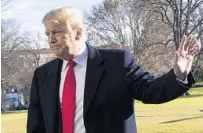  ?? GETTY ?? President Donald Trump waves to the media Sunday as he returns to the White House after a day trip to Camp David.