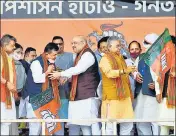  ??  ?? Former TMC leader Suvendu Adhikari joins BJP in presence of Union home minister Amit Shah in Midnapore on Saturday