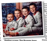  ??  ?? Festive scene: The Rooney boys on the family Christmas card