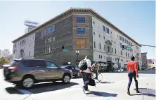  ?? Connor Radnovich / The Chronicle ?? Uber will move into the venerable Capwell building, now renovated as the Uptown Station building.