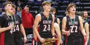  ?? JEFF GILBERT / CONTRIBUTE­D ?? Preble Shawnee’s Mason Shrout (holding trophy), Josh Miller (from left), Cooper Shrout and Dylan Campbell watch the net come down.