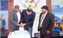  ??  ?? KUWAIT: Country Managers of Sri Lankan Airlines and Jet Airways, Amitabh Anthony Pillai and Bipin Balakrishn­an, accompanie­d by P N J Kumar, CEO of Caesars Travel Group, cutting the cake inside the new office of Khaitan, inaugurati­ng the 18th outlet of...