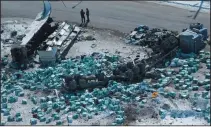  ?? THE CANADIAN PRESS/JONATHAN HAYWARD ?? The wreckage of a fatal crash outside of Tisdale, Sask., is seen Saturday. A bus carrying the Humboldt Broncos hockey team crashed into a truck en route to Nipawin.