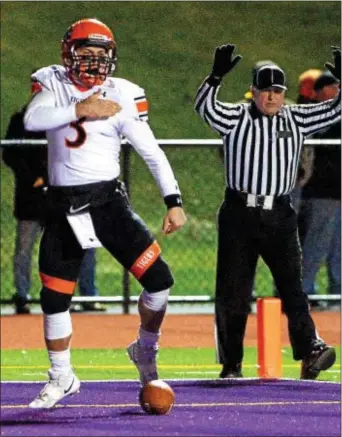  ?? BOB RAINES — DIGITAL FIRST MEDIA ?? Marple Newtown quarterbac­k Anthony Paoletti takes a moment after against Upper Moreland Friday night. scoring on a keeper