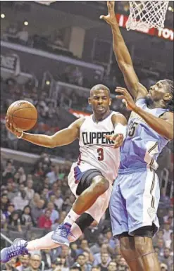  ?? AP ?? A discontent­ed Chris Paul finally ditches Clippers to join forces with dynamic guard James Harden in Houston.