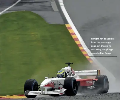  ??  ?? It might not be visible from the passenger seat, but there’s no mistaking the plunge down to Eau Rouge