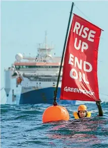  ?? PHOTO: GREENPEACE ?? Three Greenpeace activists, including executive director Russel Norman, swam in front of the Amazon Warrior off the Wairarapa coast in April to protest seismic surveys.